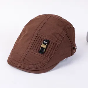 Retro brown flat cap for men and women, stylish cotton beret with metal buckle decor.