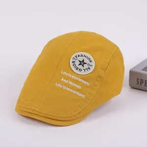 Men yellow cotton ivy cap, casual duckbill beret hat with embroidery details detail view.