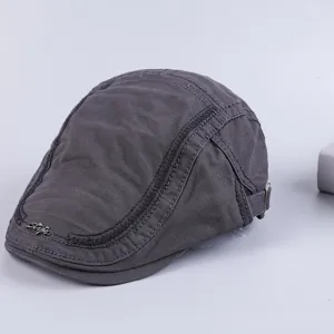 Detailed view of dark grey cotton flat cap, classic British vintage style for casual daily wear.