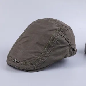 Men casual cotton flat cap newsboy hat vintage beret detail view showing textured fabric.