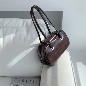 Retro oil-wax texture shoulder handbag, chic Korean style Boston pillow bag detail view.