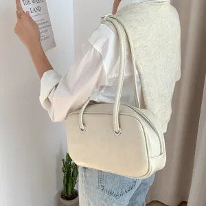 Retro oil-wax texture underarm shoulder bag chic large capacity Boston pillow bag for women.