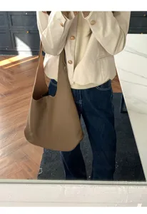 Minimalist brown soft leather shoulder bag, large capacity casual slouchy tote bag for women.