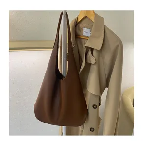Casual soft leather shoulder bag for women, large capacity stylish tote bag for daily use.