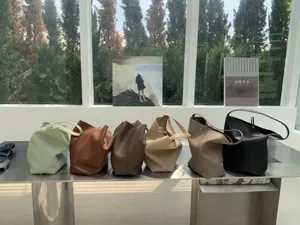 Detailed view of minimalist solid color PU leather tote bags in multiple gorgeous colors.