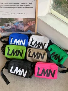 Trendy large letter nylon crossbody bag waterproof casual shoulder bag for women and men daily use.
