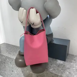 Pink PU leather shoulder bucket bag, large capacity solid color trendy underarm daily tote.