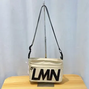 Canvas crossbody shoulder bag with bold LMN letters, casual waterproof pillow bag design.