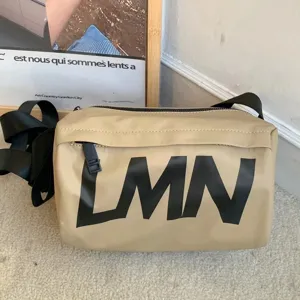 Waterproof letter print pillow crossbody bag, casual nylon shoulder bag for daily use.