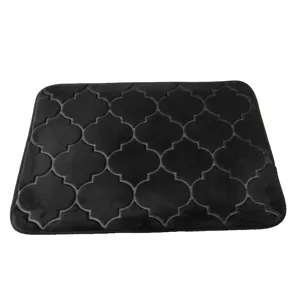 Black memory foam bath mat featuring elegant Moroccan quatrefoil pattern for non-slip floor use.