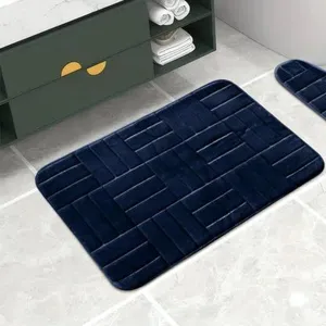 Dark blue flannel memory foam bath mat with brick pattern, absorbent anti-slip bathroom rug.