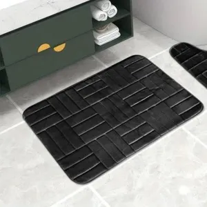 Details of the memory foam bath mat with embossed brick pattern for bathroom, super absorbent.