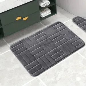 Grey flannel memory foam bathroom mat with brick texture, highly absorbent and anti-slip.