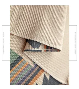 Close-up of Nordic woven cotton linen carpet texture detail, geometric ethnic pattern.