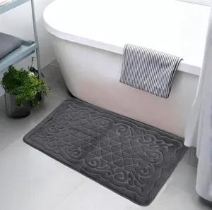 Soft flannel bath mat detail view with embossed pattern, non-slip backing for bathroom shower.