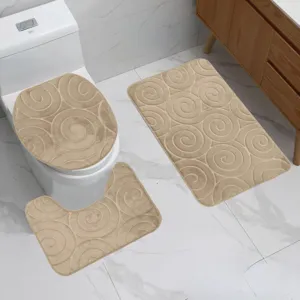 Flannel embossed swirl bathroom mat set, absorbent non-slip toilet lid cover and floor rugs.