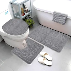 Grey flannel embossed bathroom mat set detail, anti-slip water absorbent bath rug and cover.