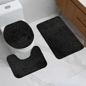 3-piece black bathroom mat set with embossed swirl design, non-slip flannel floor rug.