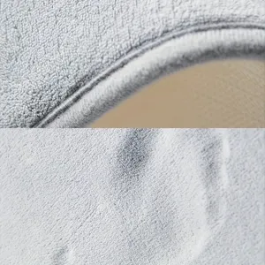 Detailed view of grey memory foam bath mat, soft microfiber texture and anti-slip backing.