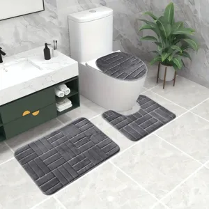 Grey flannel embossed brick memory foam bathroom mat detail, soft absorbent toilet floor rug.