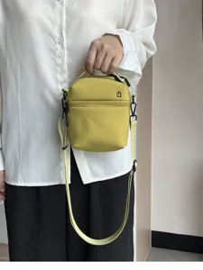 Spring summer new mini handbag zipper phone bag lightweight niche crossbody bag for women.