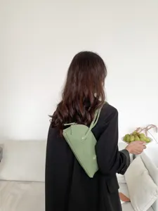 Minimalist light green shoulder bag underarm bag trendy baguette bag fashion accessory detail