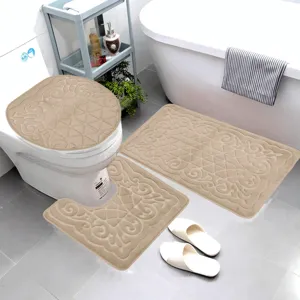 Detail view of the elegant beige flannel embossed bathroom mat set, non-slip and highly absorbent.