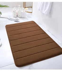 Brown striped memory foam bath mat, non-slip absorbent floor mat for bathroom and toilet.