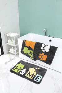 Bonito juego de alfombrillas de baño jacquard de dibujos animados con diseño antideslizante.