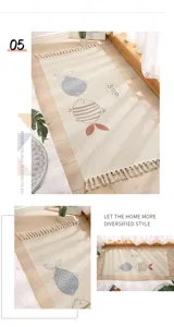 Cotton linen floor mat detail showcasing fish patterns, tassels, and cozy bedroom setting.