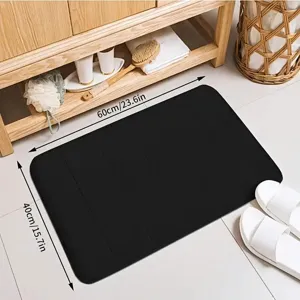 Memory foam striped bath mat, anti-slip and absorbent floor mat for bathroom and toilet use.