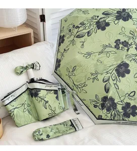 Floral folding umbrella UV protection compact sun umbrella with case and cute bow design.