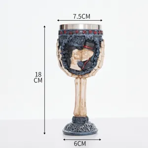 Gothic skeleton couple goblet detail view showing resin skull and stainless steel inner liner.
