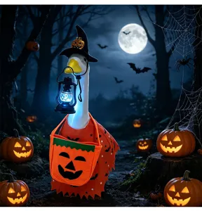 Halloween porch goose costume set with witch hat, pumpkin cape, and lantern for yard decor.