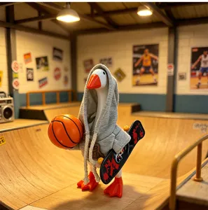 Detailed view of the 7-inch sports desktop goose toy featuring a miniature skateboard and basketball.