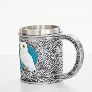 Detailed view of the resin owl mug with stainless steel inner lining and intricate relief.
