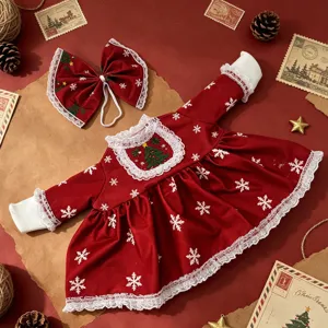 Weihnachts Gänsekleid rotes Schneeflocken Kleid mit weißer Spitze und Schleife Festdeko