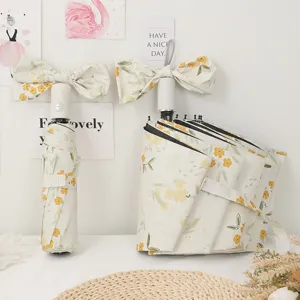 Fresh floral folding umbrella with UV protection, compact portable sun and rain dual-use umbrella.