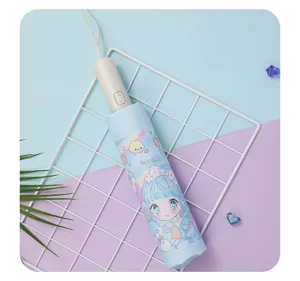 Kids folding umbrella with cute anime girl print, portable automatic design for children.