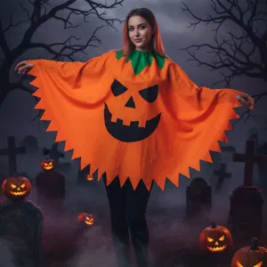 Halloween pumpkin cape detail view showcasing the vibrant orange fabric and spooky jack-o-lantern face.