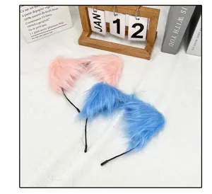 Plush cat ear headband set in pink and blue, soft fuzzy ears for cosplay and parties.