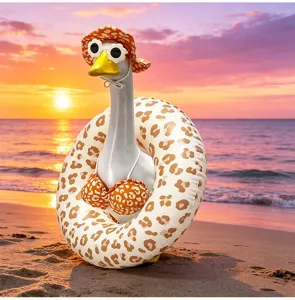 Close-up detail of a funny porch goose statue in leopard hat, bikini, and sunglasses.