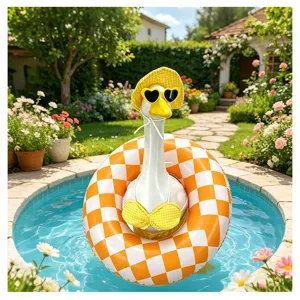 Detailed view of the cute garden goose wearing a chic bikini, sunglasses, and swim ring.