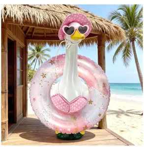 Detail view of tropical summer porch goose outfit featuring pink bikini and star swim ring.