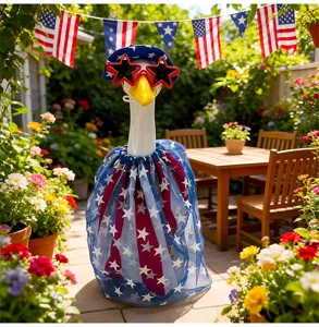 Independence Day porch goose outfit detail featuring star sunglasses, hat, and tutu skirt.