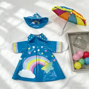 Cute 23-inch doll raincoat hat and umbrella three-piece set with rainbow star pattern.