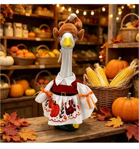 Vista detallada del atuendo de ganso de Acción de Gracias con sombrero de pavo y vestido calabaza.