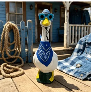 Chic 23-inch porch goose garden statue with cowboy hat, floral sunglasses and blue bandana.