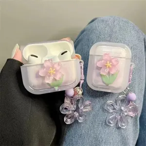 Detailed view of lilac AirPods Pro case with 3D pink flower and matching floral charm
