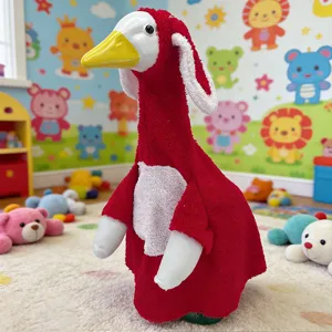Drôle d'oie en peluche avec costume rouge pour décoration de fête et événement spécial.